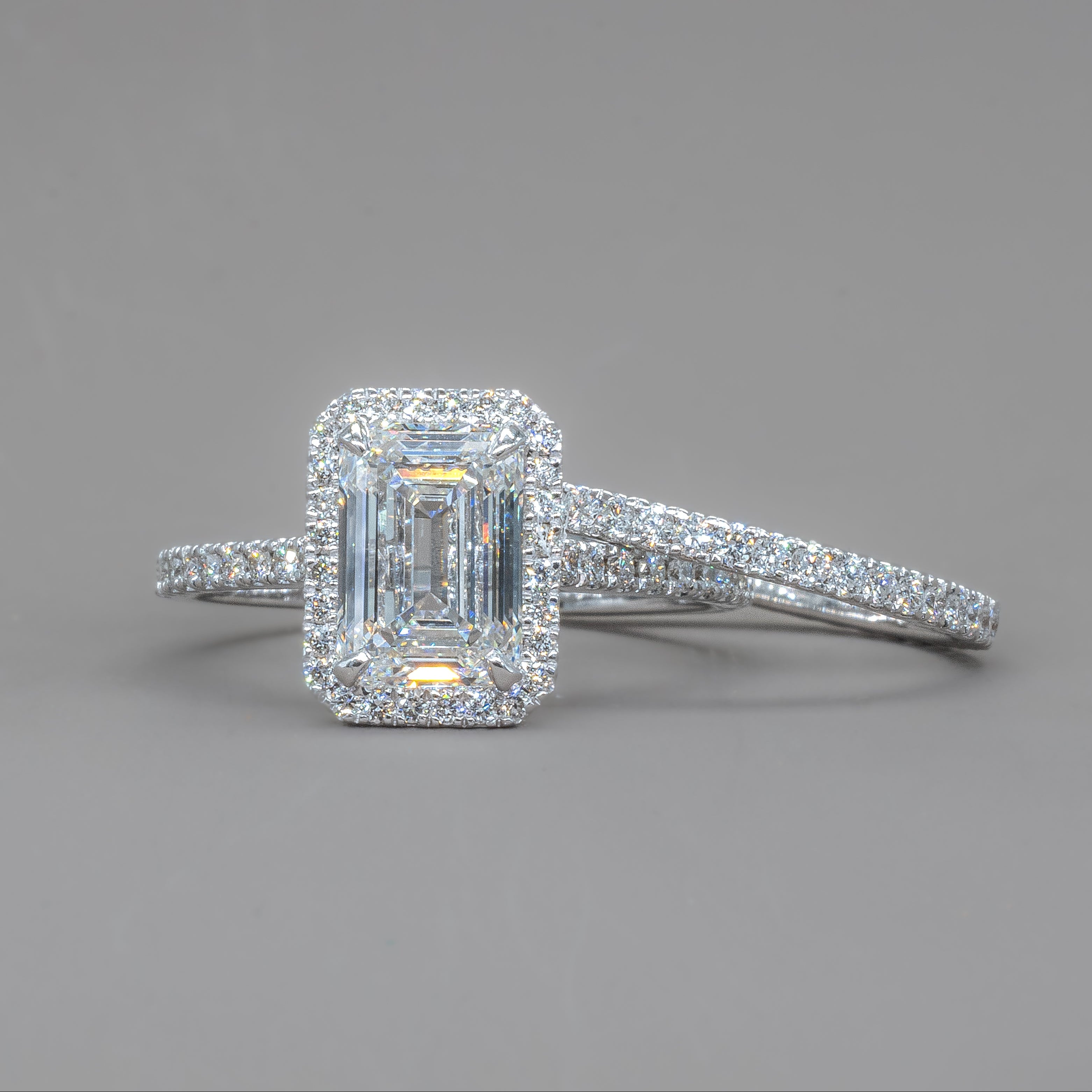 HALO EMERALD ENGAGEMENT RING
