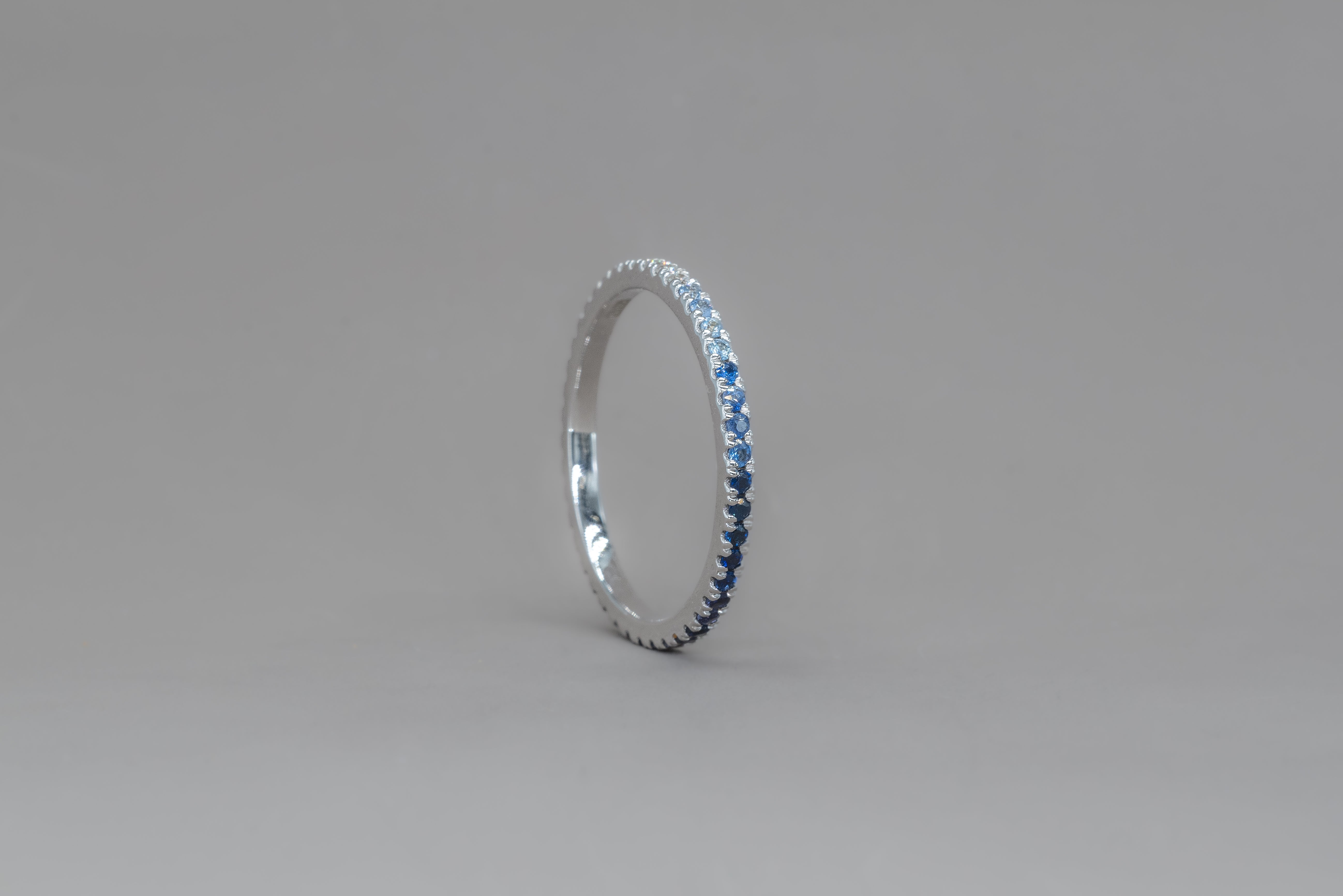 UNDECIDED PETIT BLUE ETERNITY RING