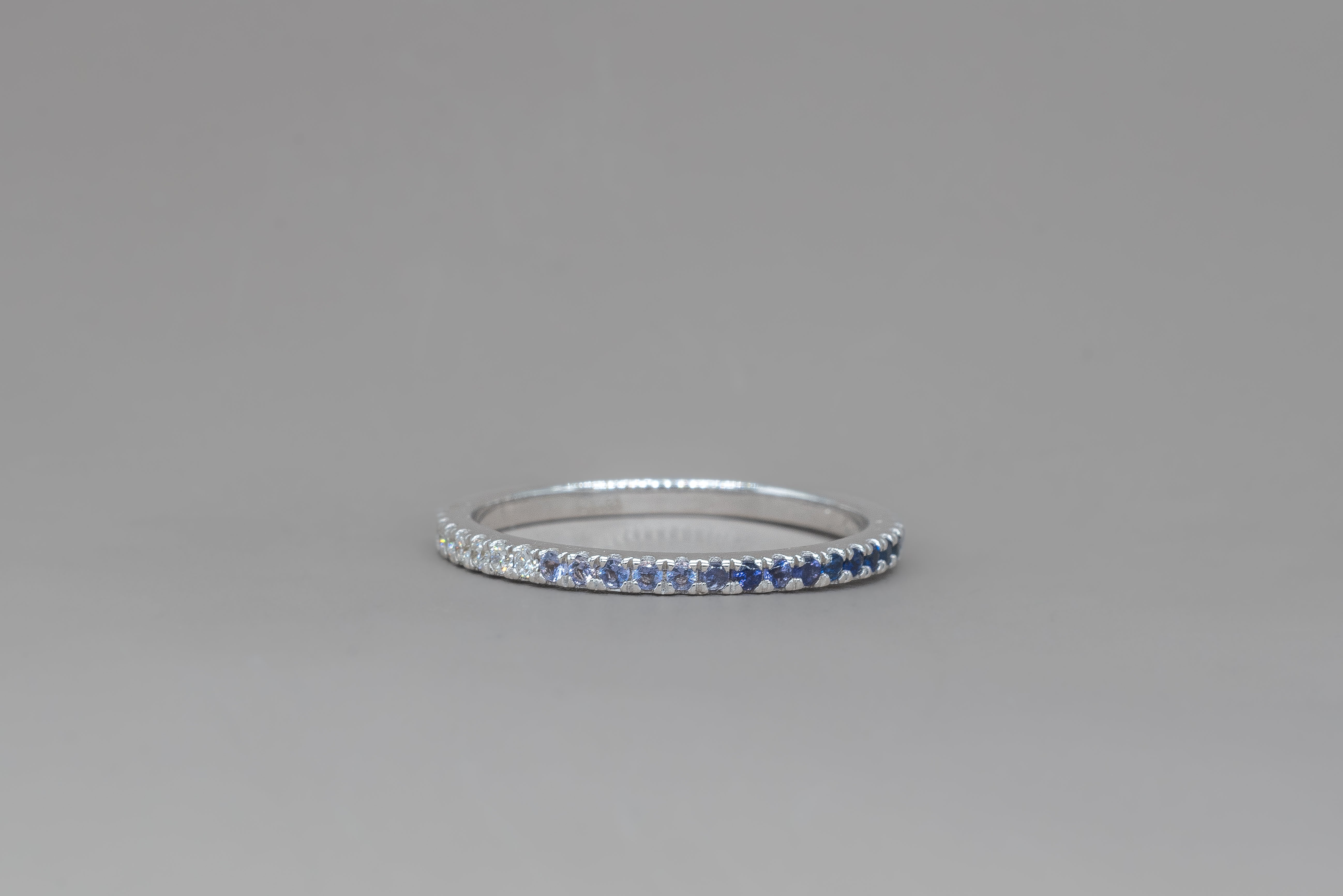 UNDECIDED PETIT BLUE ETERNITY RING