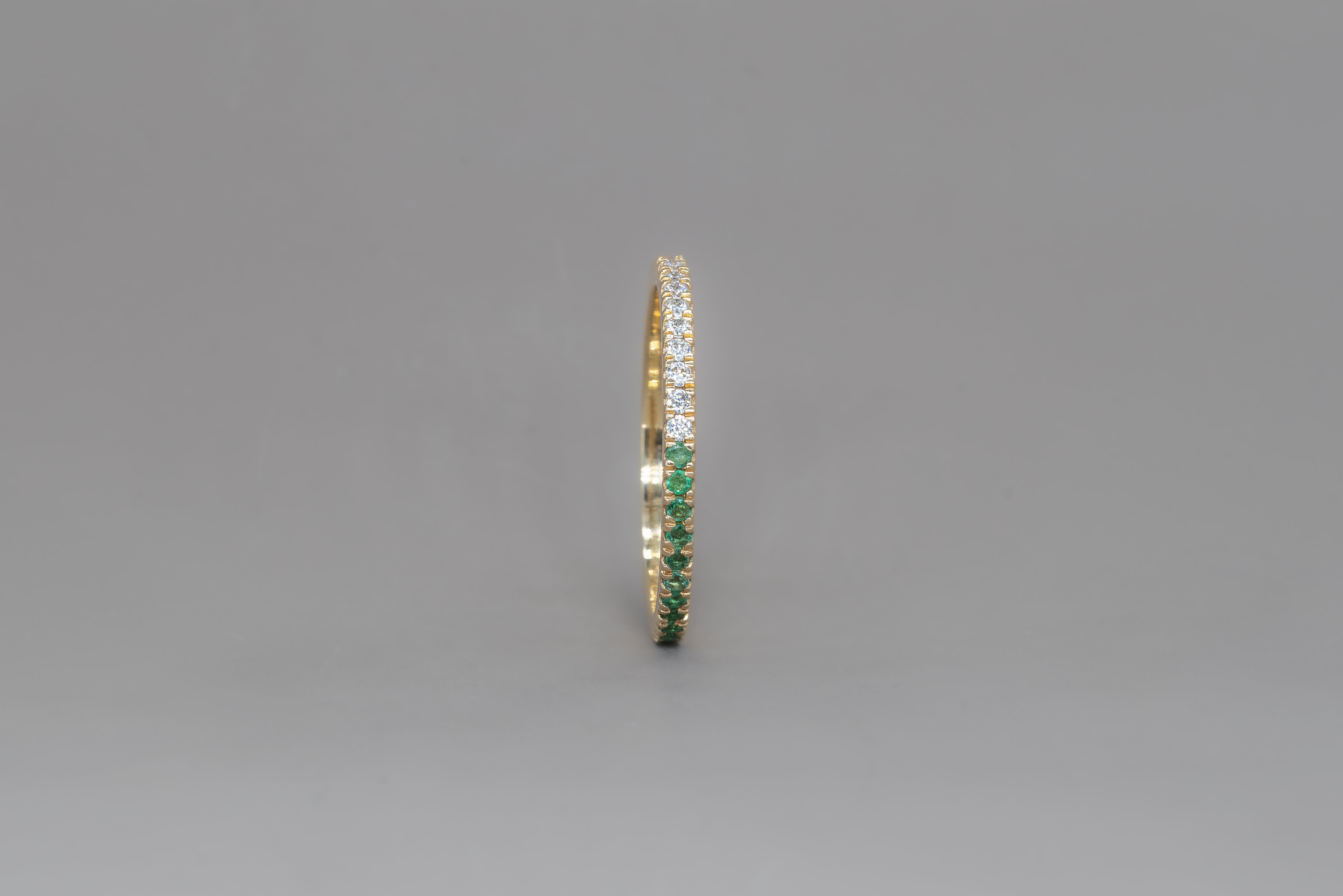 UNDECIDED PETIT GREEN ETERNITY RING