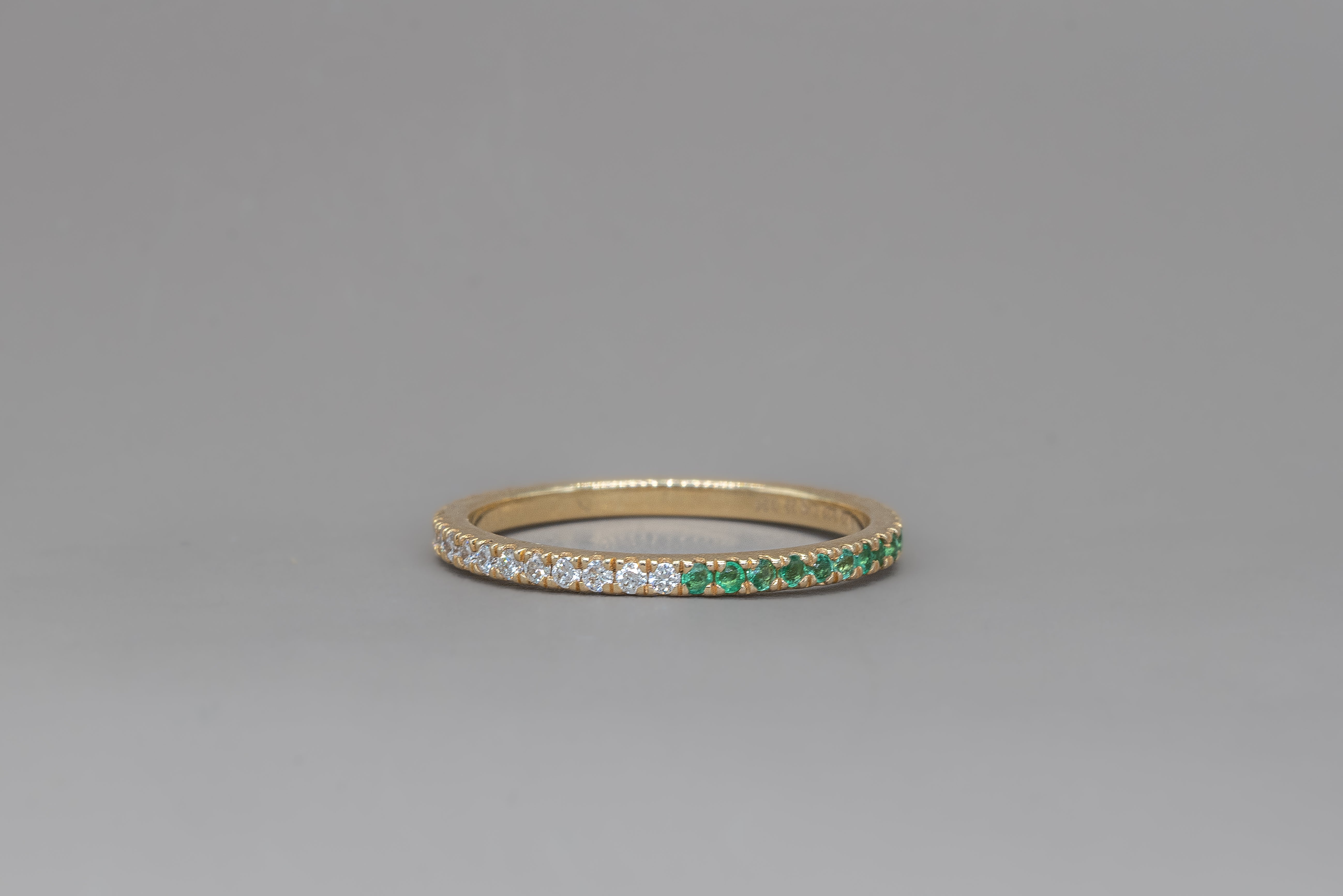 UNDECIDED PETIT GREEN ETERNITY RING