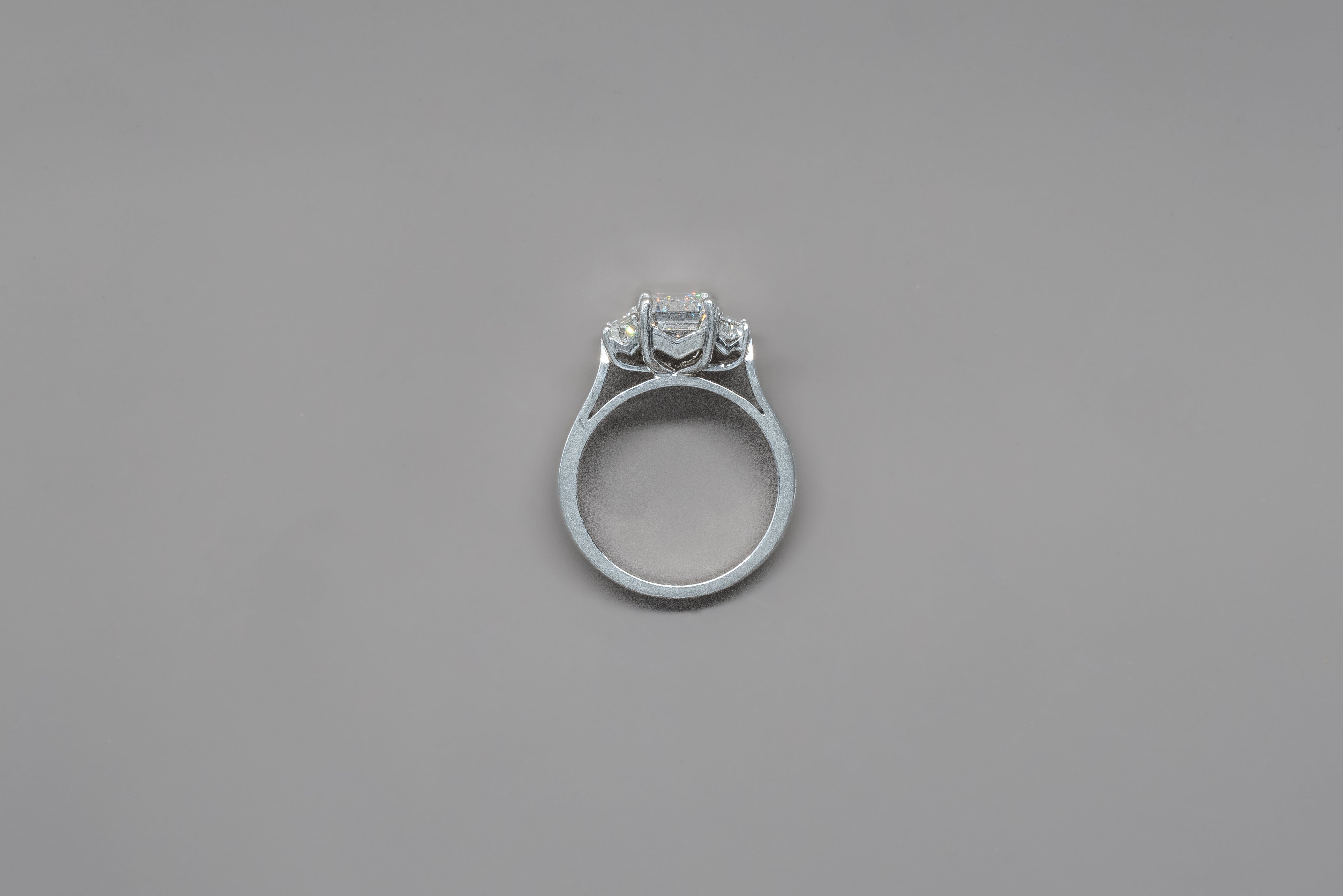 TRIO EMERALD ENGAGEMENT RING