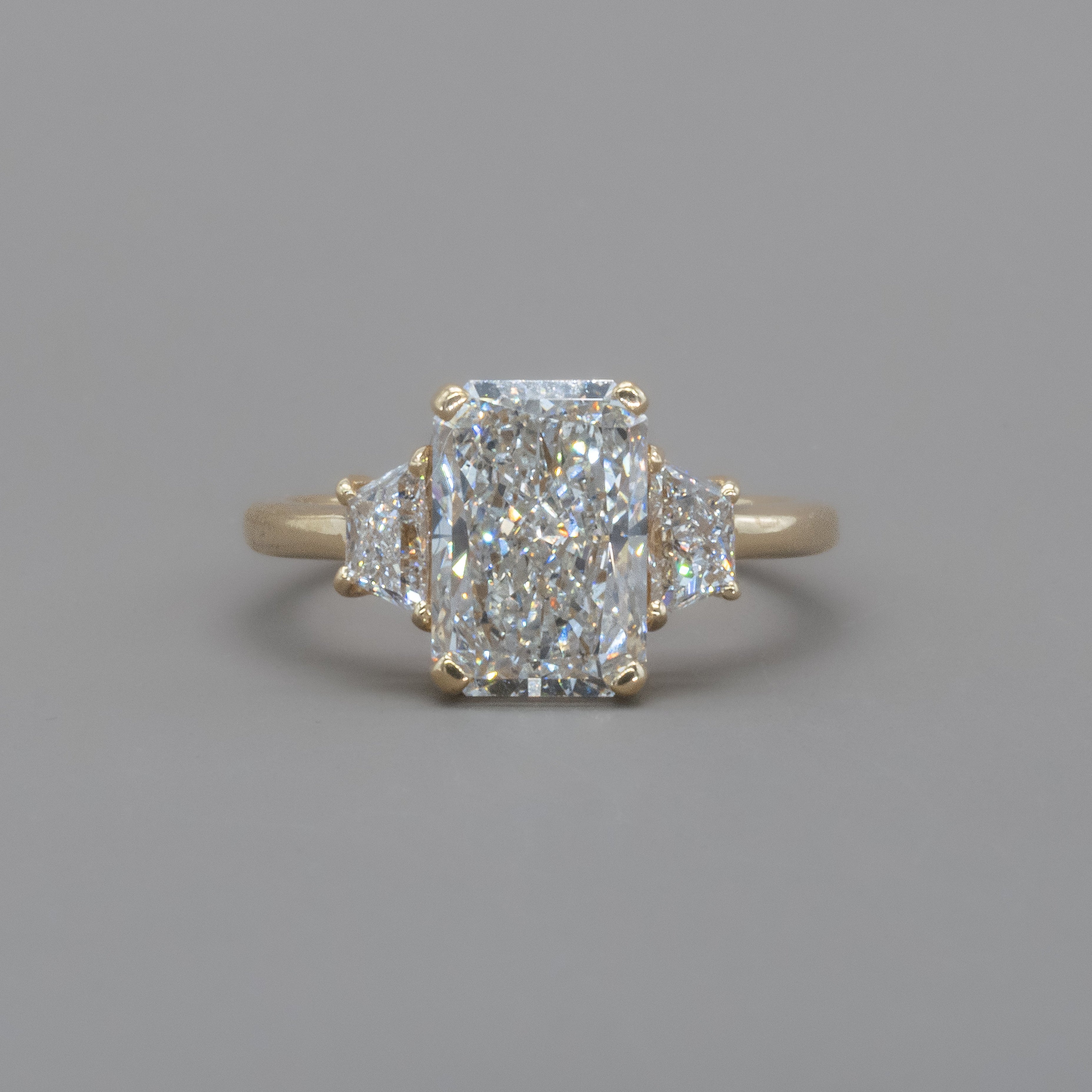 TRIO RADIANT ENGAGEMENT RING