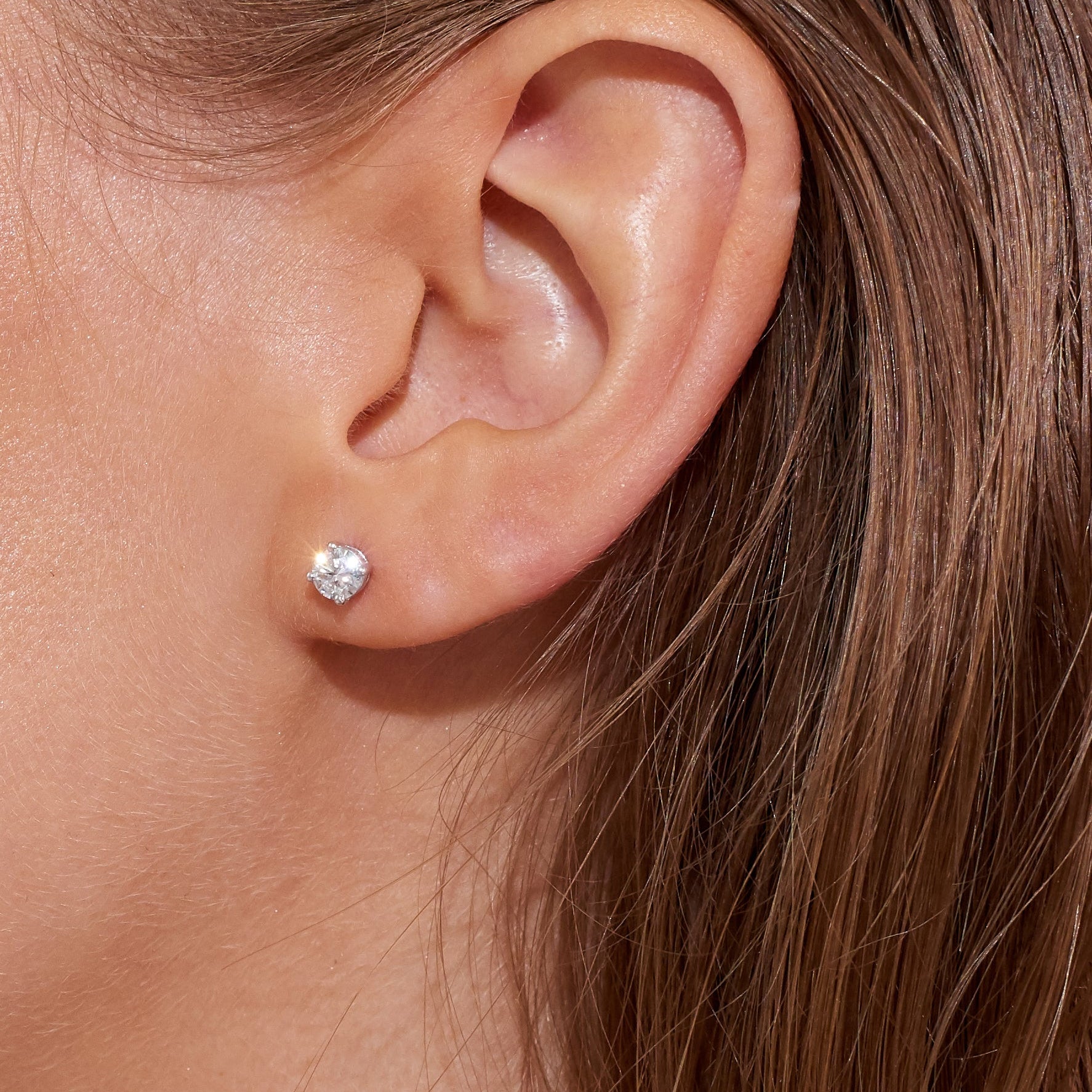 STUD PIERCING 0,6 CT