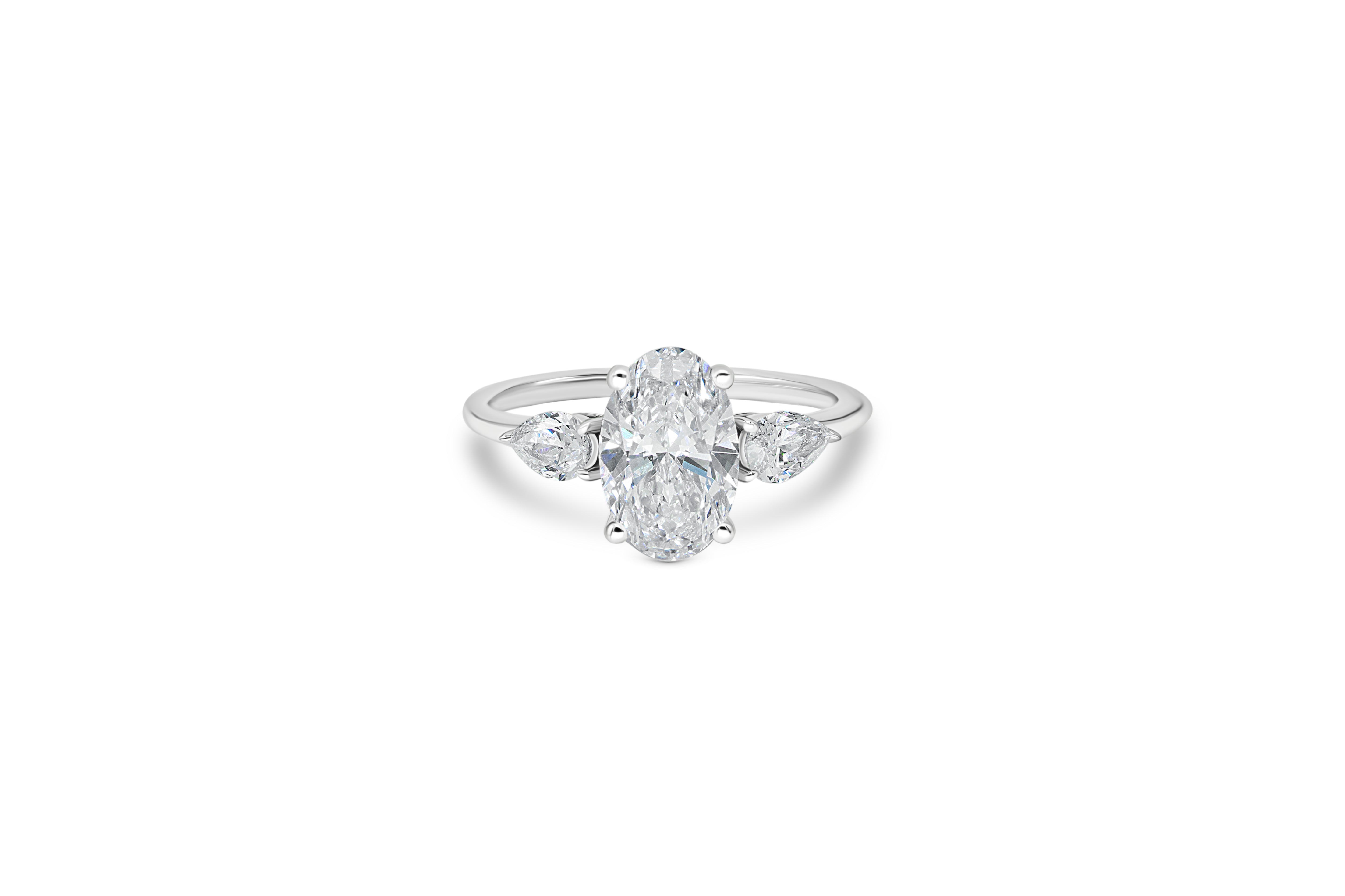 TRIO OVAL ENGAGEMENT RING