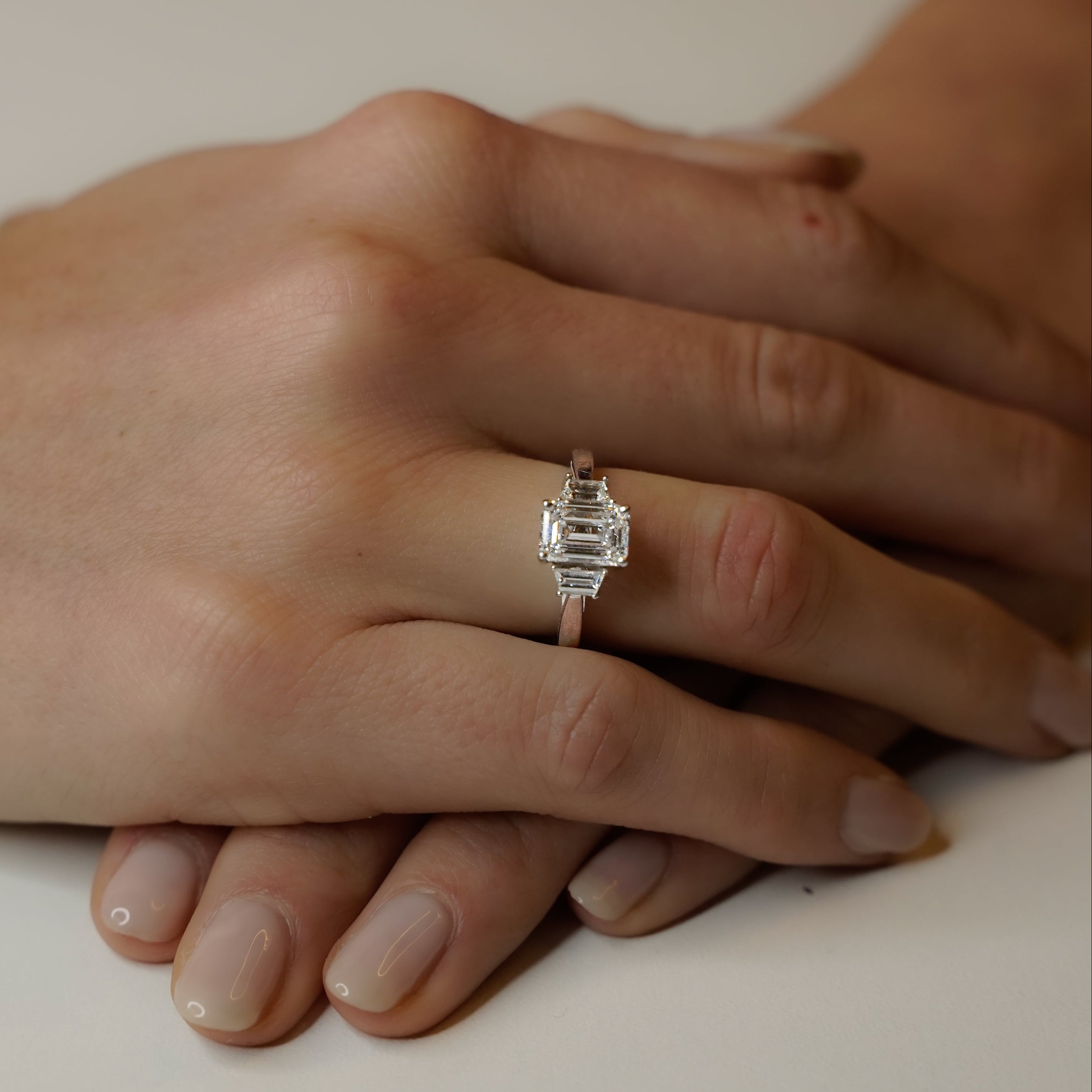TRIO EMERALD ENGAGEMENT RING