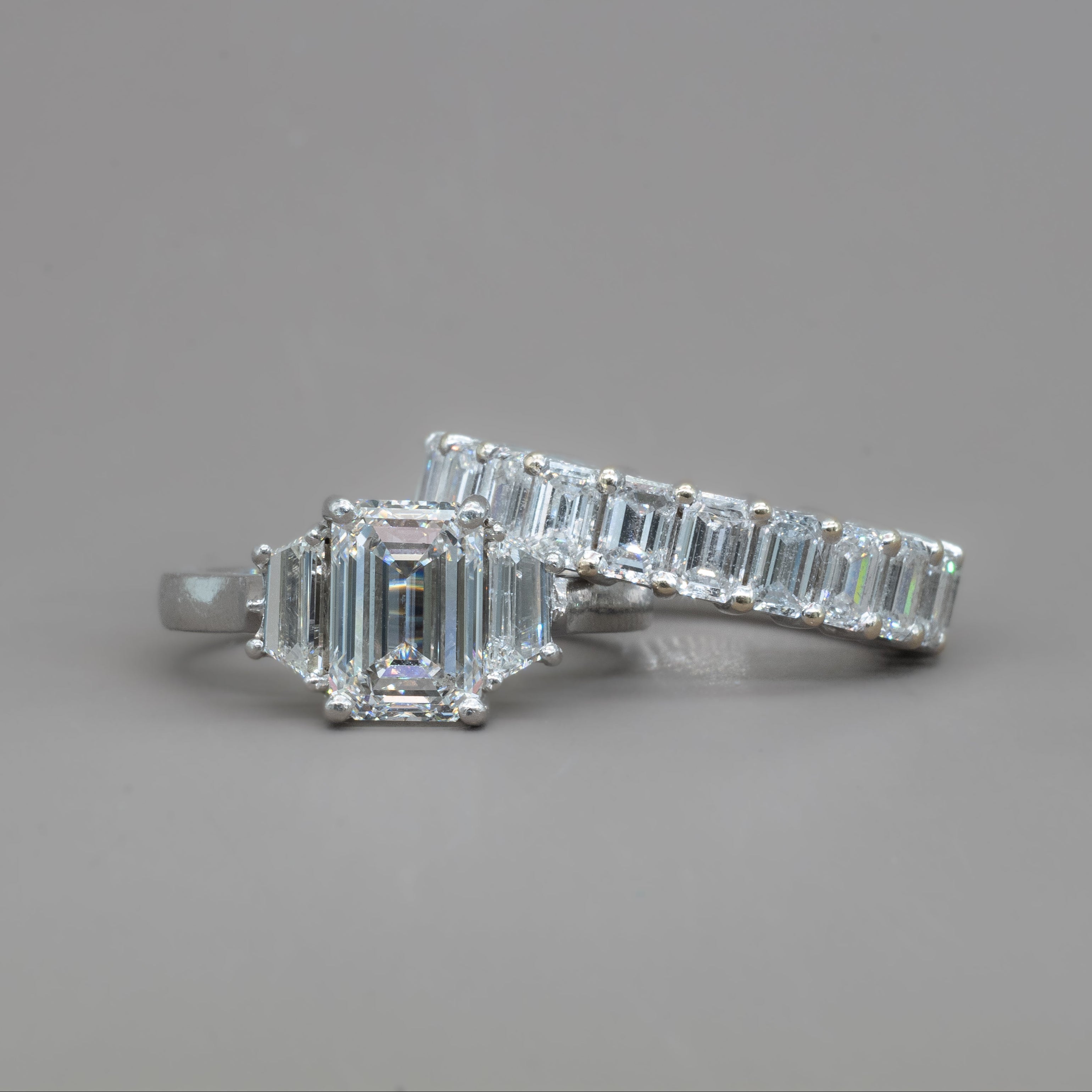 TRIO EMERALD ENGAGEMENT RING