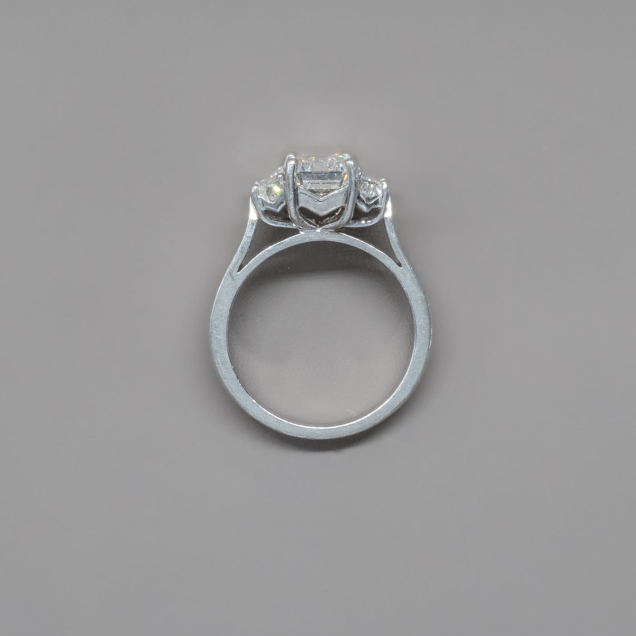 TRIO EMERALD ENGAGEMENT RING