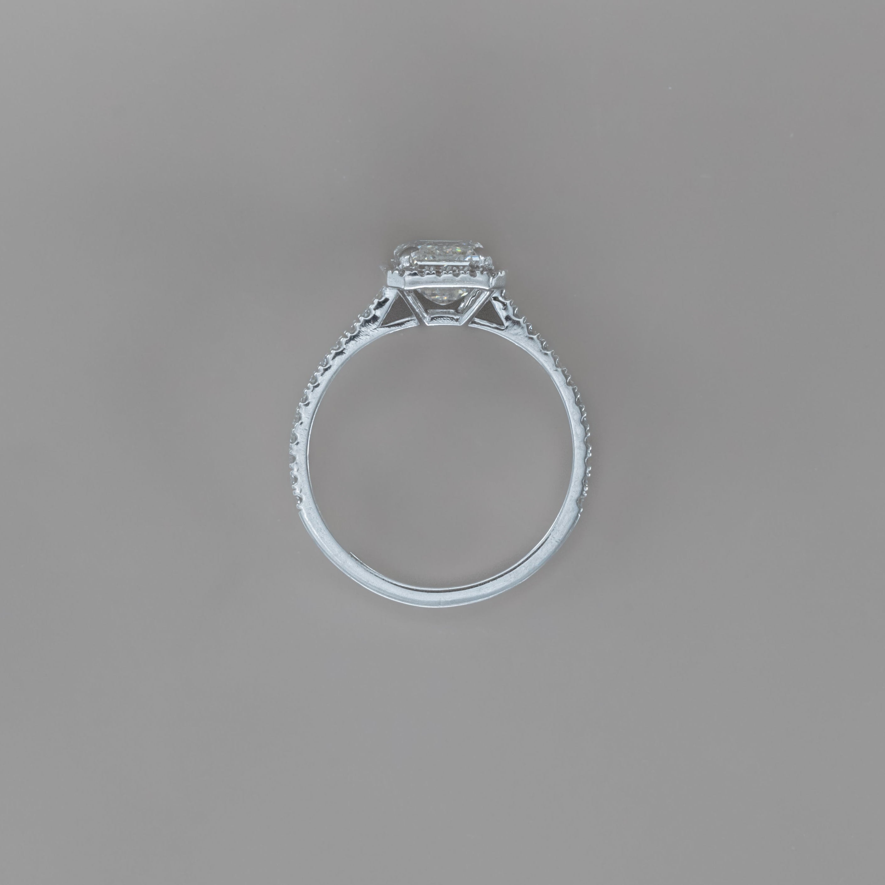 HALO EMERALD ENGAGEMENT RING