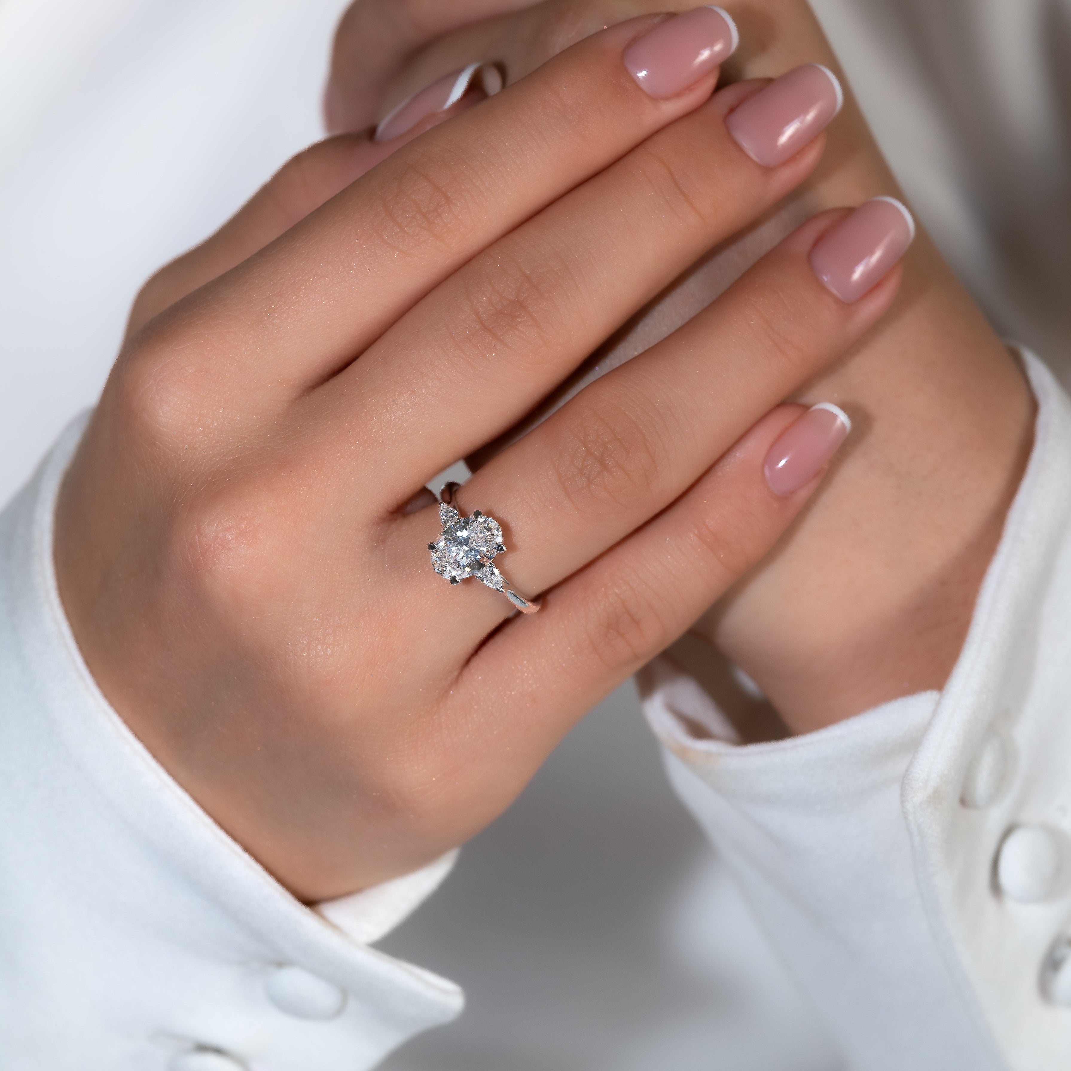 TRIO OVAL ENGAGEMENT RING